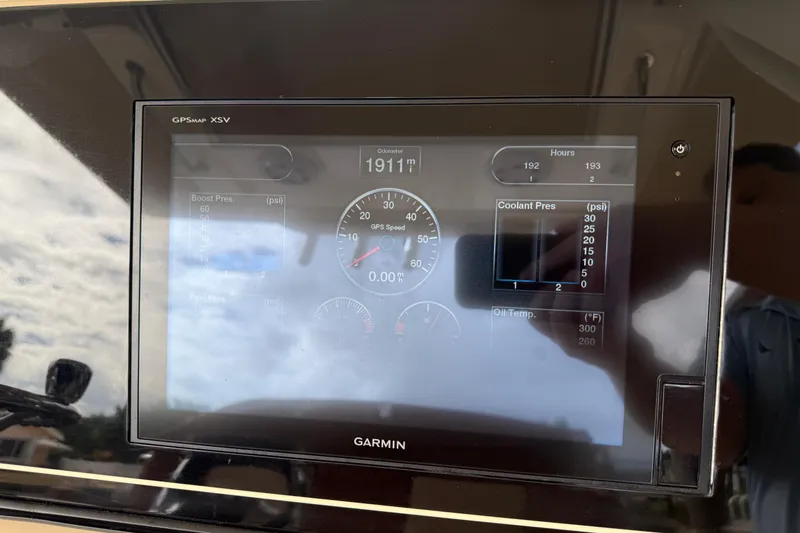 T/t B Happy Yacht Photos Pics Garmin GPS display on 2019 Scout 320 LXF boat showing engine metrics.