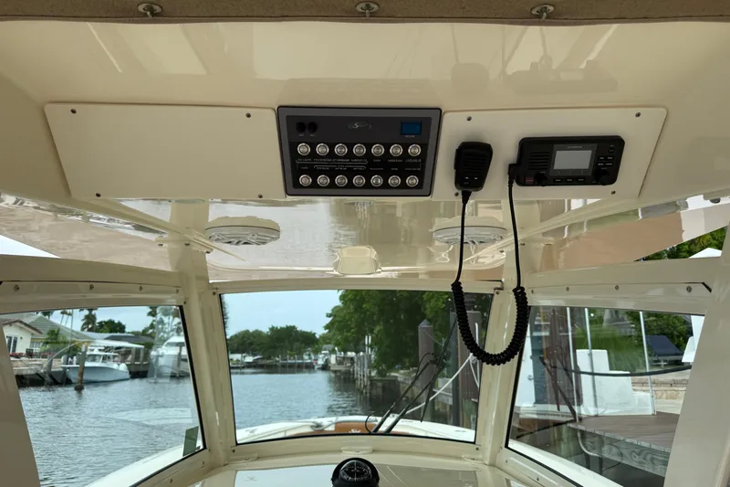T/t B Happy Yacht Photos Pics Interior view of 2019 Scout 320 LXF boat's control panel and communication devices.