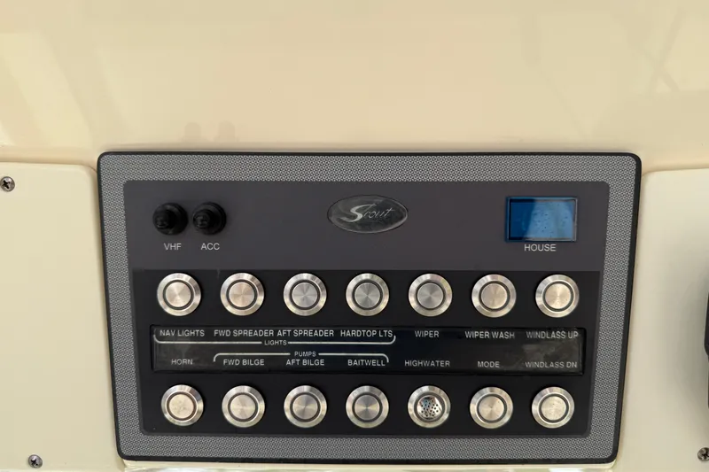 T/t B Happy Yacht Photos Pics Control panel of a 2019 Scout 320 LXF boat with labeled switches and buttons.