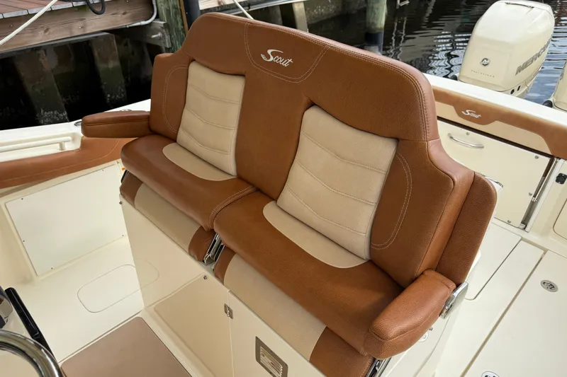 T/t B Happy Yacht Photos Pics 2019 Scout 320 LXF boat with luxurious brown and beige seating.
