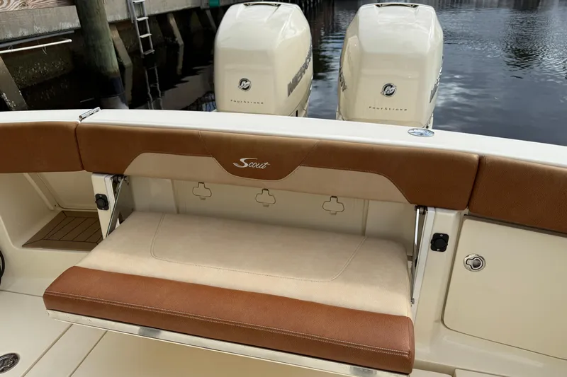 T/t B Happy Yacht Photos Pics 2019 Scout 320 LXF boat with dual Mercury outboard engines and cushioned seating.