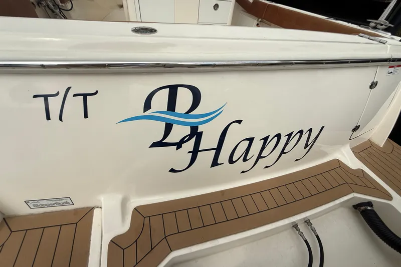 T/t B Happy Yacht Photos Pics 2019 Scout 320 LXF boat with "Happy" name on the side.