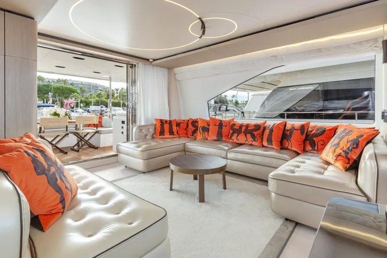 Solstice Yacht Photos Pics Luxurious interior of 2020 Azimut 72 Flybridge yacht with modern seating and vibrant cushions.