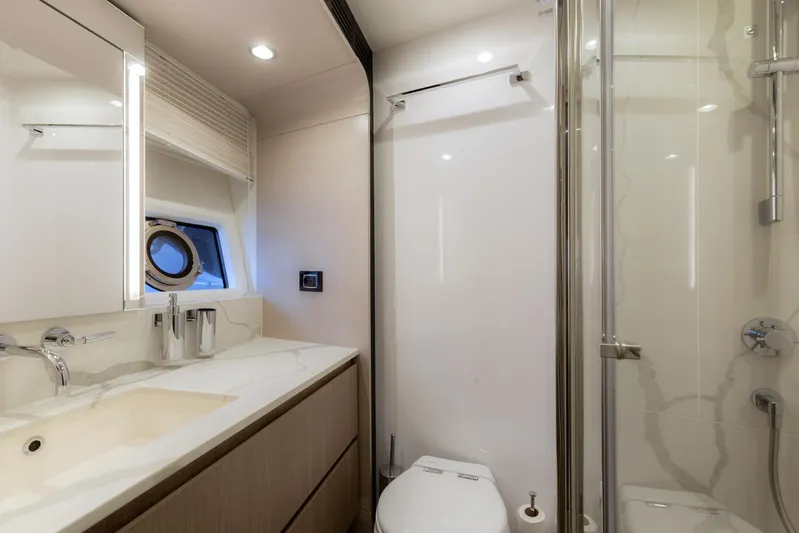 Solstice Yacht Photos Pics Luxurious bathroom in 2020 Azimut 72 Flybridge yacht with modern fixtures and elegant design.
