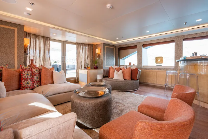 Liberty Yacht Photos Pics Luxurious yacht interior with modern decor, plush seating, and large windows, ISA 50M 2011 model.