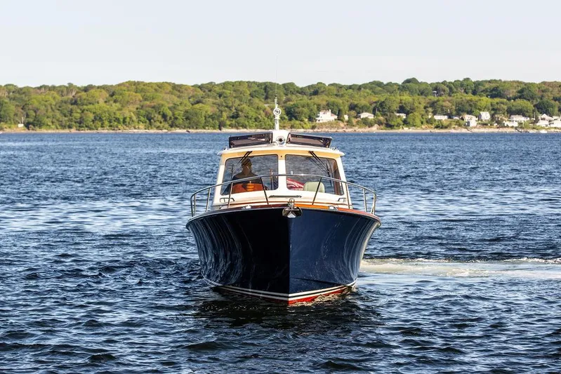 Brendan Yacht Photos Pics 2018 Hinckley Picnic Boat 37 MKIII cruising on a scenic lake.