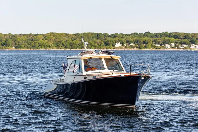 Brendan Yacht Photos Pics 2018 Hinckley Picnic Boat 37 MKIII cruising on a scenic lake.