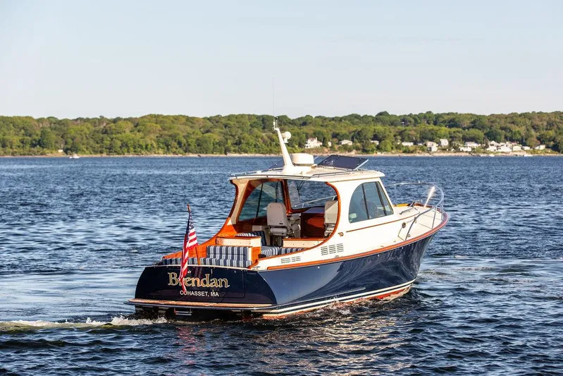 Brendan Yacht Photos Pics 2018 Hinckley Picnic Boat 37 MKIII cruising on a scenic lake.
