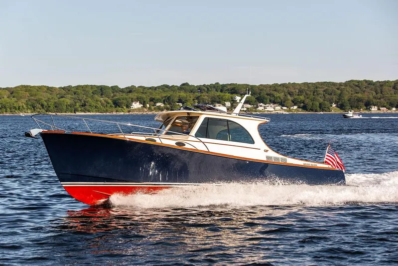 Brendan Yacht Photos Pics 2018 Hinckley Picnic Boat 37 MKIII cruising on a scenic lake.