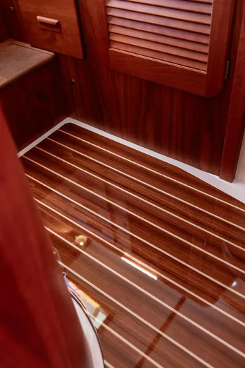 Brendan Yacht Photos Pics Hinckley Picnic Boat 37 MKIII 2018 interior with polished wooden flooring.