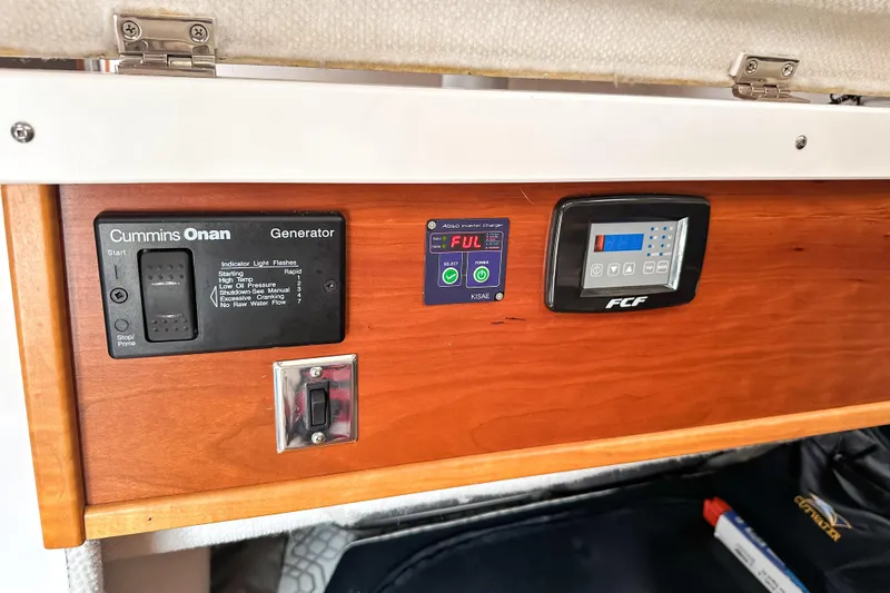  Yacht Photos Pics Control panel of a 2022 Cutwater 30 Command Bridge with generator and power charger.