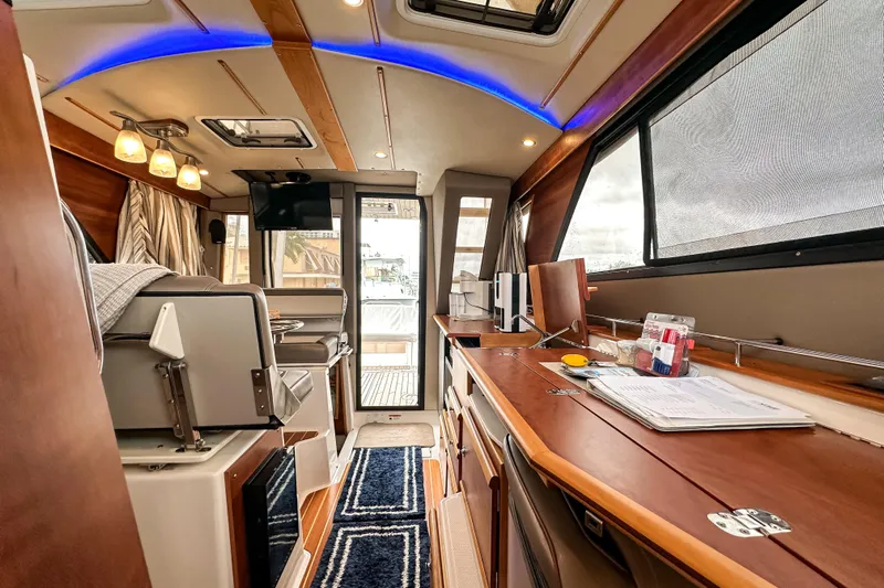  Yacht Photos Pics Interior of 2022 Cutwater 30 Command Bridge, featuring modern design and wood finishes.