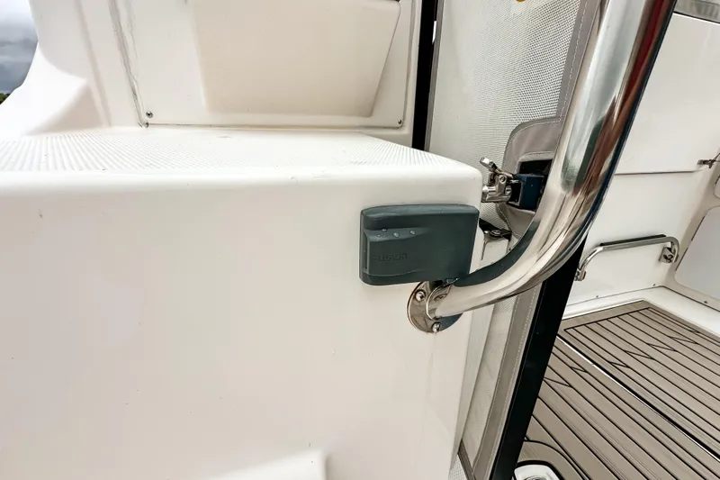  Yacht Photos Pics 2022 Cutwater 30 Command Bridge boat interior with Fusion audio system and stainless steel railing.