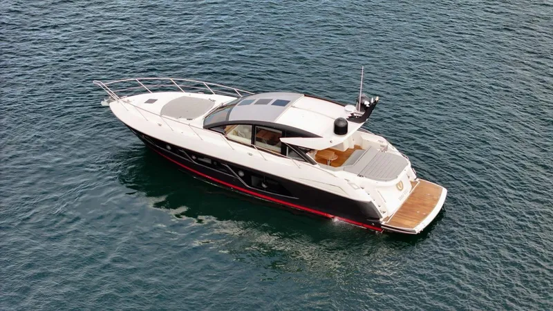 Veni Vici Yacht Photos Pics 2019 Sunseeker Predator 57 yacht on open water, sleek design, luxury motorboat.