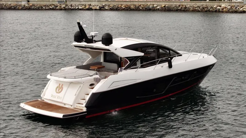 Veni Vici Yacht Photos Pics 2019 Sunseeker Predator 57 yacht on water, sleek design, luxury motorboat.