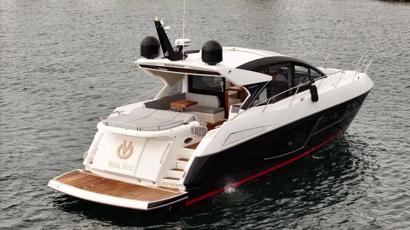 Veni Vici Yacht Photos Pics 2019 Sunseeker Predator 57 yacht cruising on water, rear view.