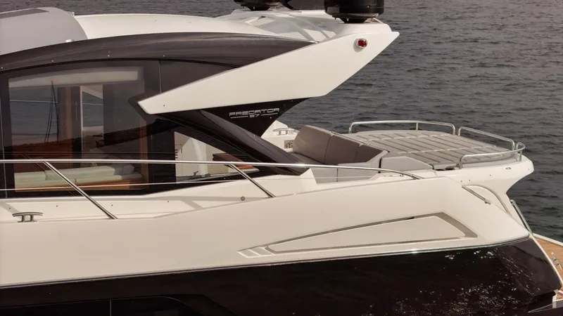 Veni Vici Yacht Photos Pics 2019 Sunseeker Predator 57 yacht on water, sleek design, luxury features.