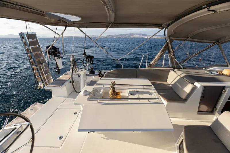  Yacht Photos Pics Luxurious 2019 Beneteau Oceanis 51.1 yacht deck with seating and ocean view.