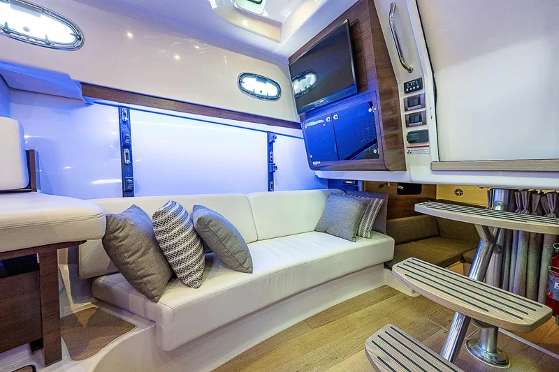 Paradise 4 Reels Yacht Photos Pics Boston Whaler 345 Paradise 4 Reels-Cabin Seating, TV and Electrical Panel