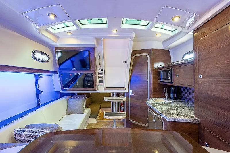 Paradise 4 Reels Yacht Photos Pics Boston Whaler 345 Paradise 4 Reels-Cabin, TV, Seating, Galley Area