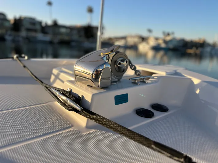 Together Again II Yacht Photos Pics Close-up of 2022 Ranger Tugs R-31 CB boat deck with winch and rope.