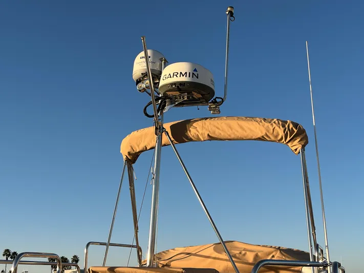 Together Again II Yacht Photos Pics 2022 Ranger Tugs R-31 CB with Garmin radar against clear blue sky.