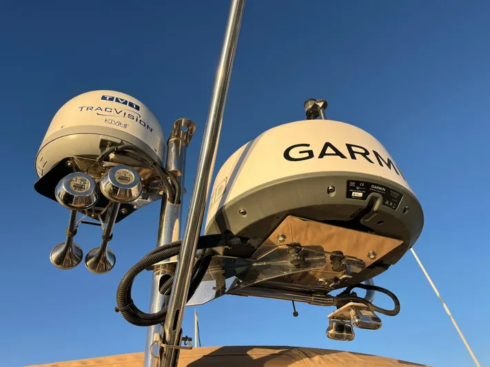 Together Again II Yacht Photos Pics Garmin and TracVision antennas on 2022 Ranger Tugs R-31 CB boat under clear sky.