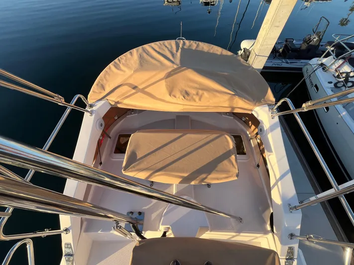 Together Again II Yacht Photos Pics 2022 Ranger Tugs R-31 CB boat with tan canopy and seating, docked at marina.