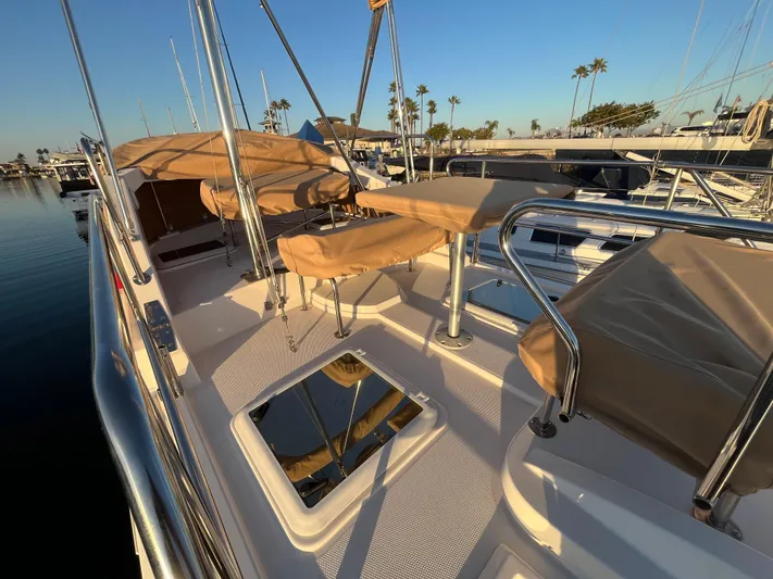 Together Again II Yacht Photos Pics 2022 Ranger Tugs R-31 CB boat deck with seating, docked in sunny marina.