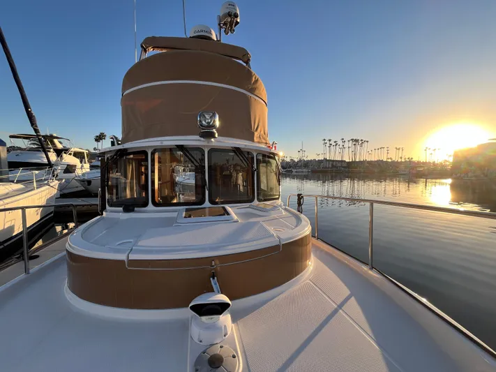 Together Again II Yacht Photos Pics 2022 Ranger Tugs R-31 CB boat at sunset in marina.
