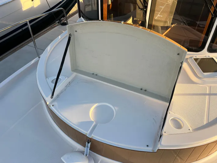 Together Again II Yacht Photos Pics 2022 Ranger Tugs R-31 CB boat deck with open storage compartment.