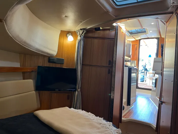 Together Again II Yacht Photos Pics Interior of 2022 Ranger Tugs R-31 CB boat, featuring cozy cabin and modern amenities.