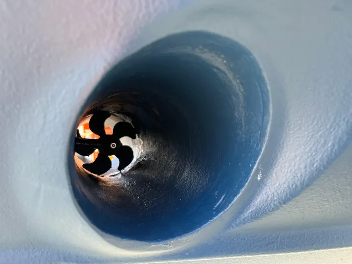 Together Again II Yacht Photos Pics Bow thruster of 2022 Ranger Tugs R-31 CB, showcasing internal propeller design.