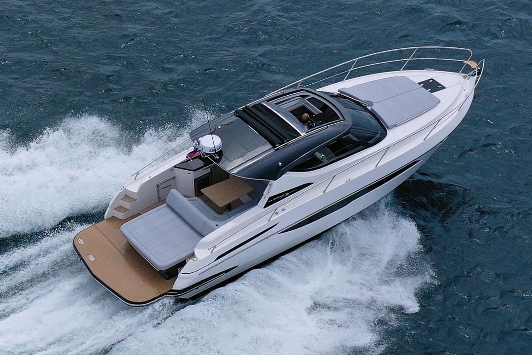 2025 Focus Power 36 yacht cruising on open water, showcasing sleek design and luxury features.