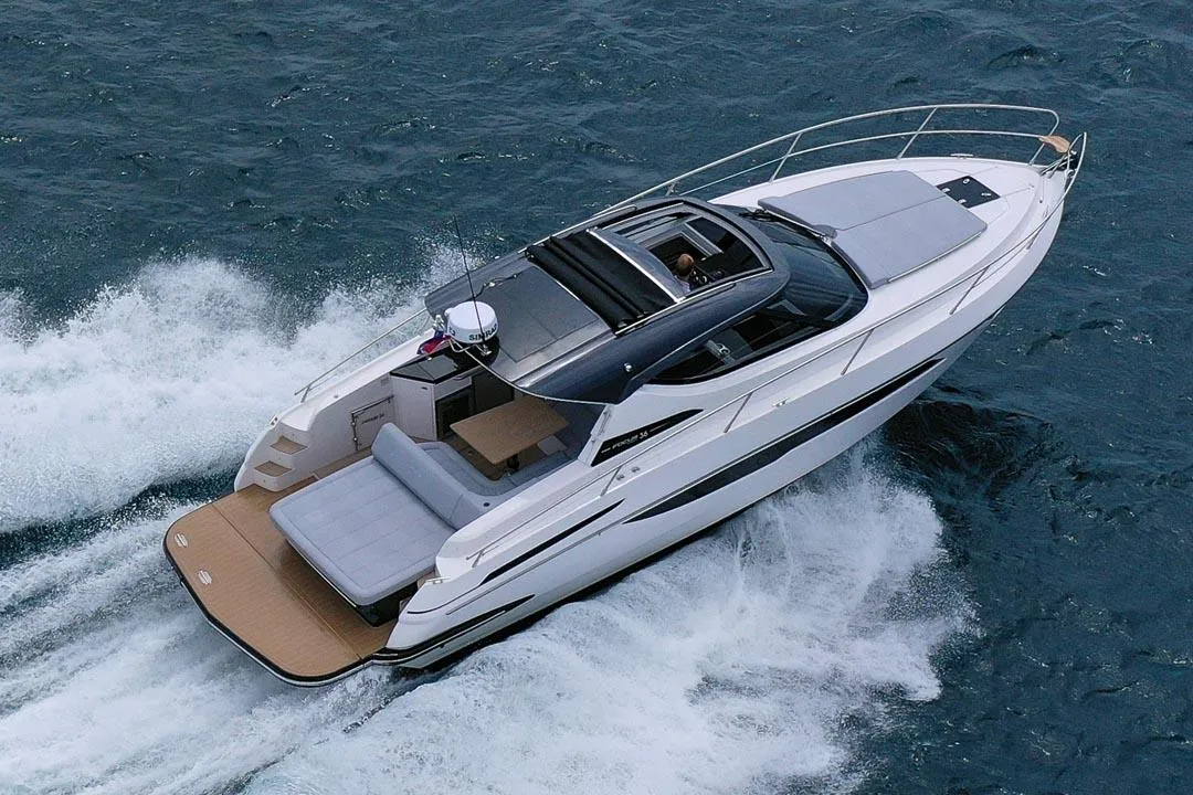 2025 Focus Power 36 yacht cruising on open water, showcasing sleek design and luxury features.