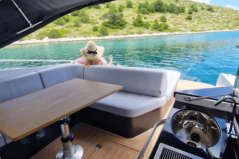  Yacht Photos Pics Luxury yacht Focus Power 36, 2025 model, with scenic water view and comfortable seating.