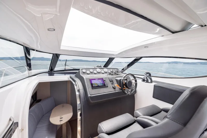  Yacht Photos Pics Modern interior of 2025 Focus Power 36 yacht with sleek design and advanced navigation system.