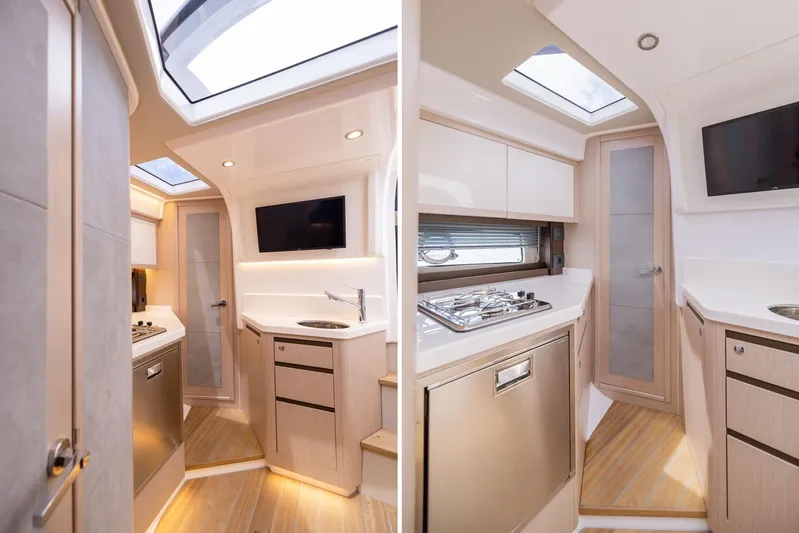  Yacht Photos Pics Luxurious interior of 2025 Focus Power 36 yacht with modern kitchen and skylight.
