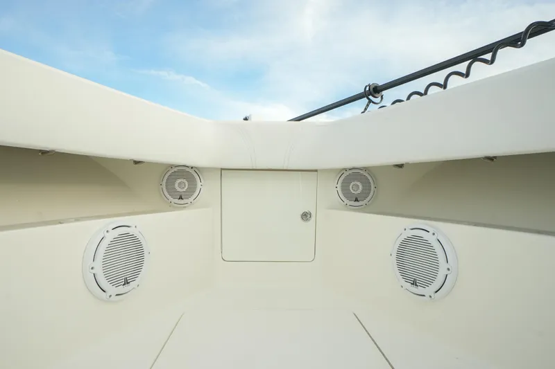 Yacht Photos Pics 2013 SeaVee 390B boat interior with speakers and storage compartment.