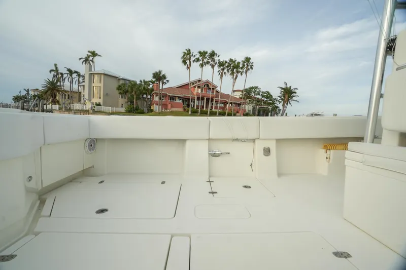  Yacht Photos Pics 2013 SeaVee 390B boat deck with coastal view and palm trees.