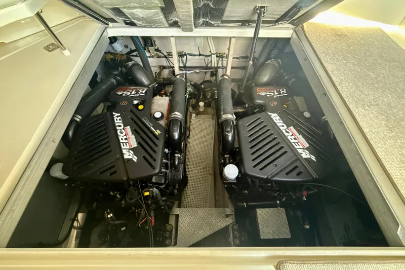 Off The Air Yacht Photos Pics Engine compartment of a 2004 Sea Ray 380 Sundancer with twin Mercury engines.