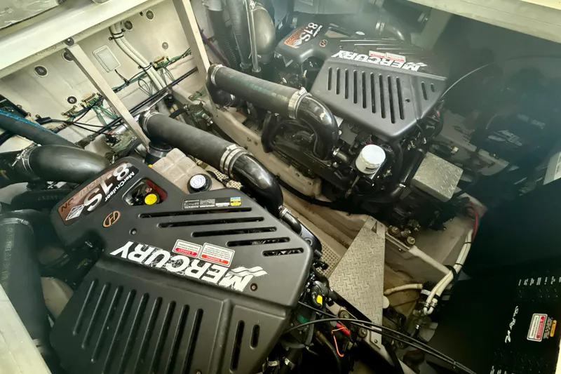 Off The Air Yacht Photos Pics Engine room of 2004 Sea Ray 380 Sundancer with twin MerCruiser engines.