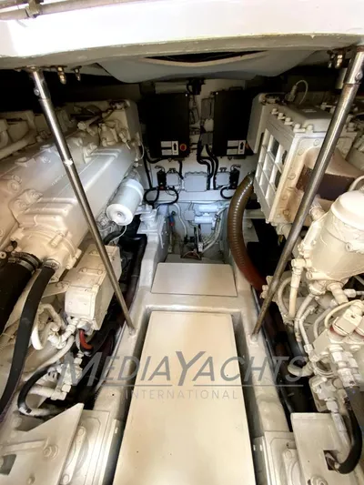  Yacht Photos Pics Engine room of 2005 Uniesse 48 Open yacht, showcasing mechanical components and systems.