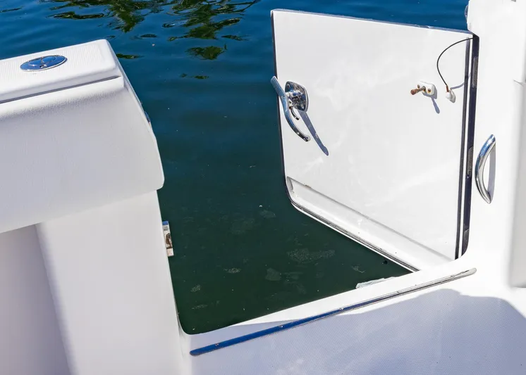  Yacht Photos Pics Invincible 37 Catamaran 2019, open side door view, near water.