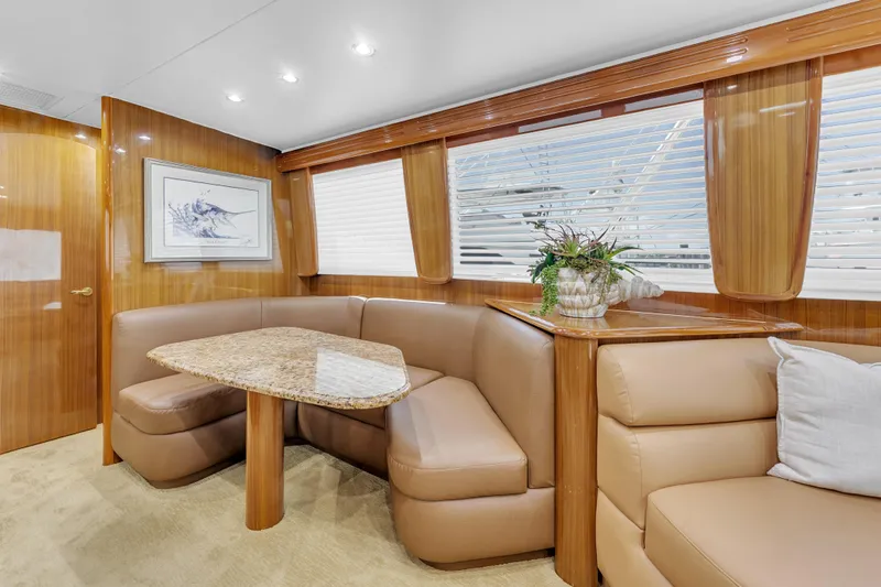 Triple B Yacht Photos Pics Luxurious interior of a 2007 Viking Convertible yacht with plush seating and elegant decor.