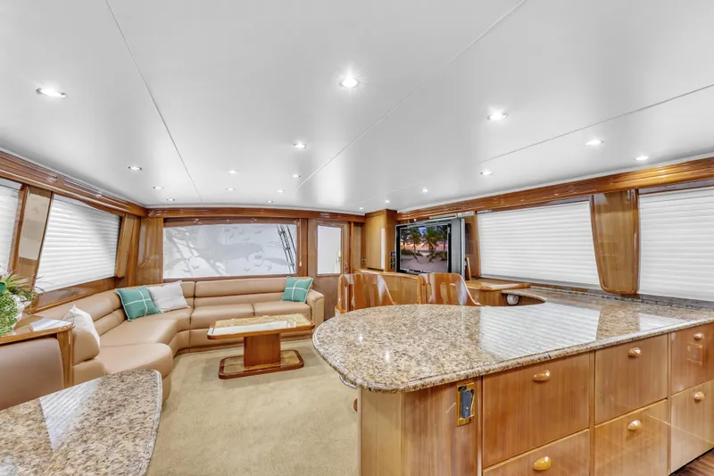 Triple B Yacht Photos Pics Luxurious interior of a 2007 Viking Convertible yacht with elegant seating and granite countertops.