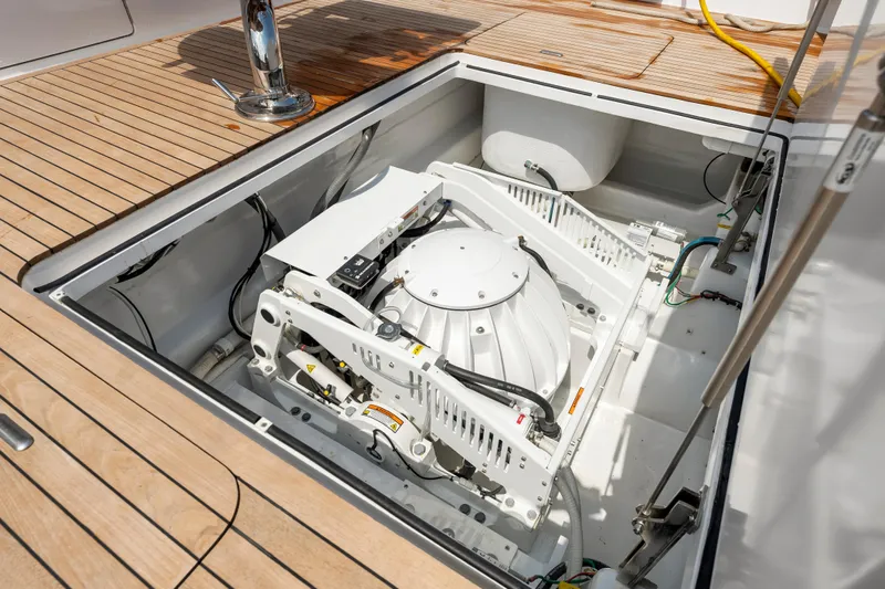 Triple B Yacht Photos Pics 2007 Viking Convertible yacht engine compartment with advanced machinery and wooden deck.