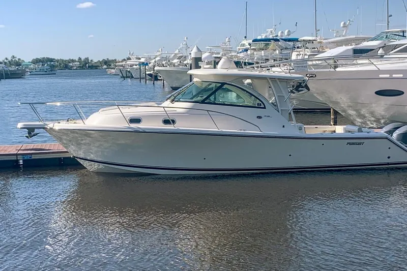 Little Solace Yacht Photos Pics 2012 Pursuit OS 345 Offshore boat docked at marina, calm water, clear sky.
