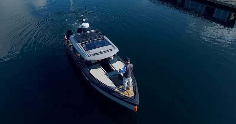  Yacht Photos Pics Aerial view of 2023 Arksen 30 boat on calm water.