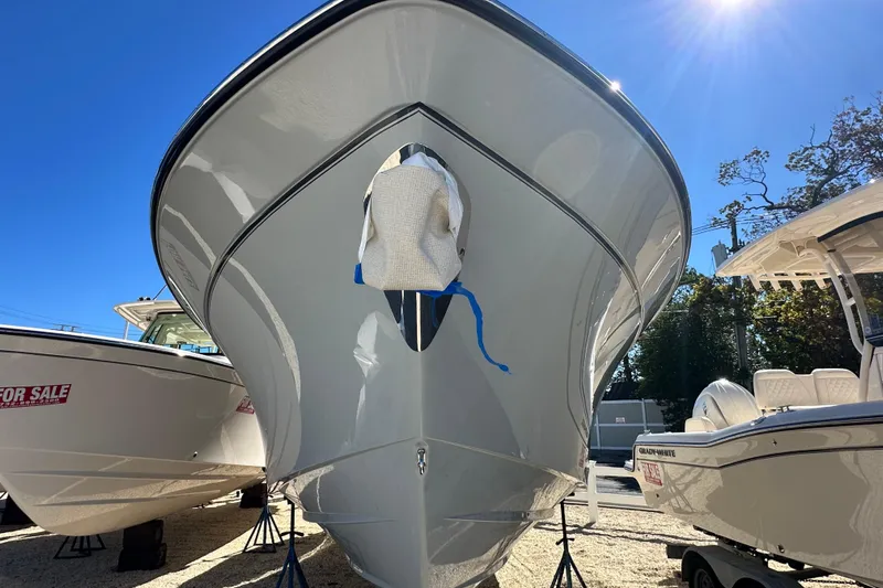  Yacht Photos Pics 2026 Grady-White Canyon 306 boat on display under bright sunlight.